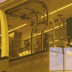 Preview thumbnail for While we are on the topic of interesting McDonalds this is the Macca's in the Sydney airport, it has a conveyor belt from the 2nd floor to the first floor where people order and receive their food. image