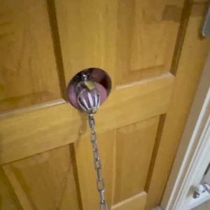 Preview thumbnail for Punished my chastity sub by chaining his locked cock in our gloryhole for 3hrs image