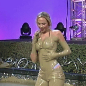 Preview thumbnail for Hottest Outfit Tournament (Stacy Keibler edition) continues!! Next outfit: Mud outfit vs. Red shirt/shorts outfit image